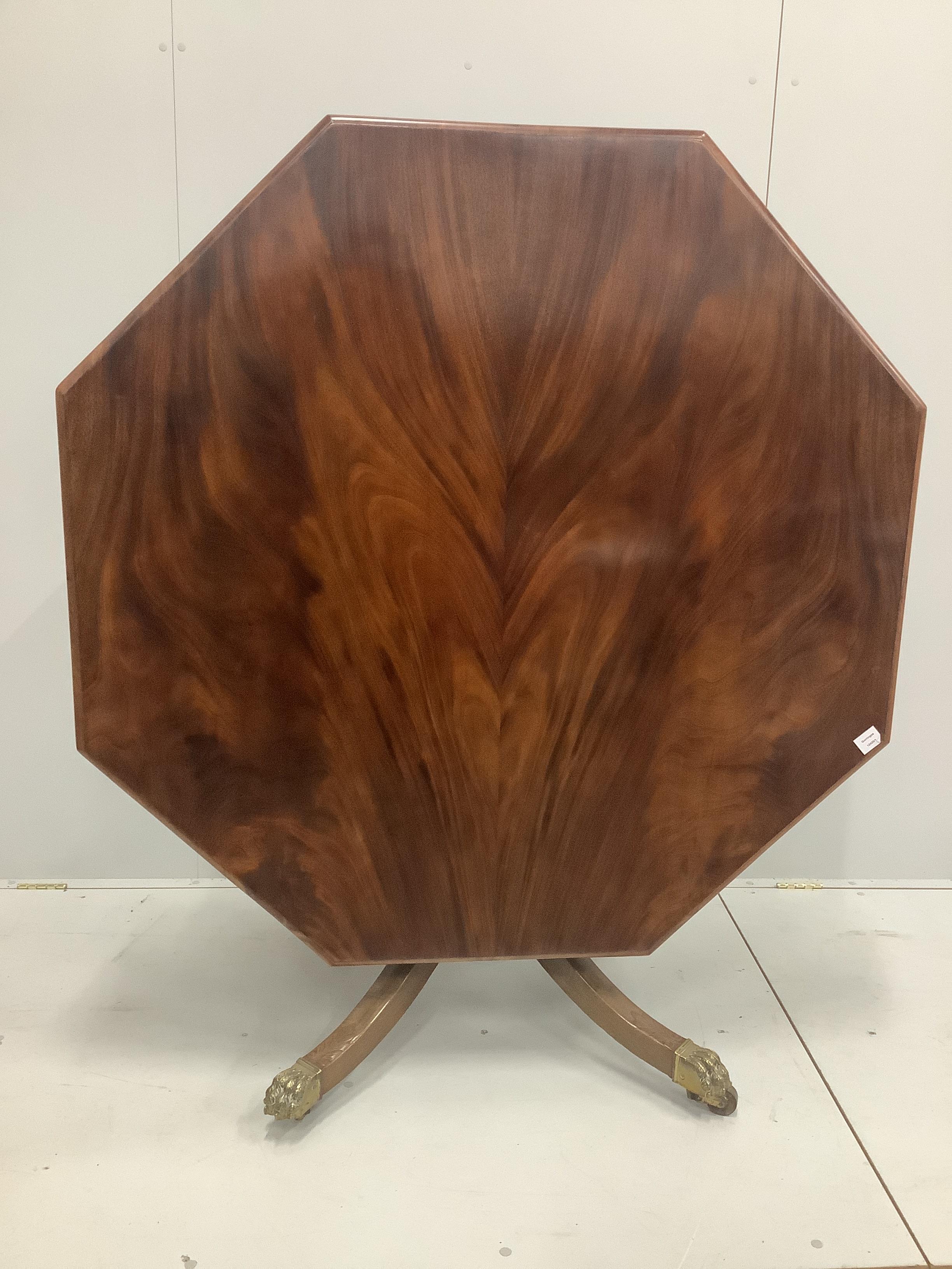 A Regency mahogany octagonal tilt top breakfast table, width 128cm, height 72cm